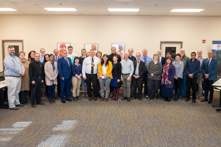 Chief Junior Gould of the Abegweit First Nation addressed the University Senate on March 6. Here he is pictured along with his wife Ella and members of the Senate photo of Chief Gould with the UPEI Senate