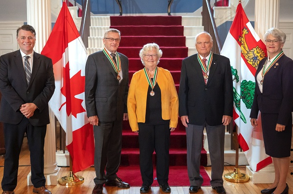 Dr. Olive Bryanton, centre, received the Order of PEI insignia at Government House. Also pictured from left to right are the Hon. Dennis King, Premier of PEI; recipients Bev Simpson and Henry Purdy; and the Hon. Antoinette Perry, Lieutenant Governor of PEI Order of PEI recipients at Government House