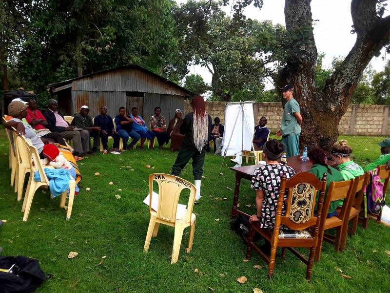 Farmers in Kenya participate in a training session. Standing at right is Dr. John VanLeeuwen. Farmers in Kenya participate in a training session. Standing at right is Dr. John VanLeeuwen.