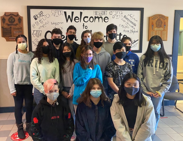 Students from Queen Charlottetown Intermediate School. Back row: Sarah Woods, Luke Butler, Alex Forbes, Antonio Moraru, Megan Nabuurs. Middle row: Hasna Mady, Daniela Yorinori, Leticia Alvarez, Noah Hemphill, Jerome Chen, Jannah McCallum, Layla Do. Front row: Carter Matthews, Rhaya Adams, Hannah Huynh. Missing: Serena Wang. A group of intermediate students