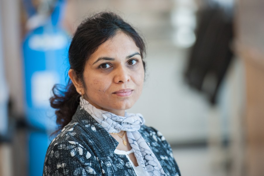 Dr. Marya Ahmed A medium close-up of a female scientist in a chemistry lab.