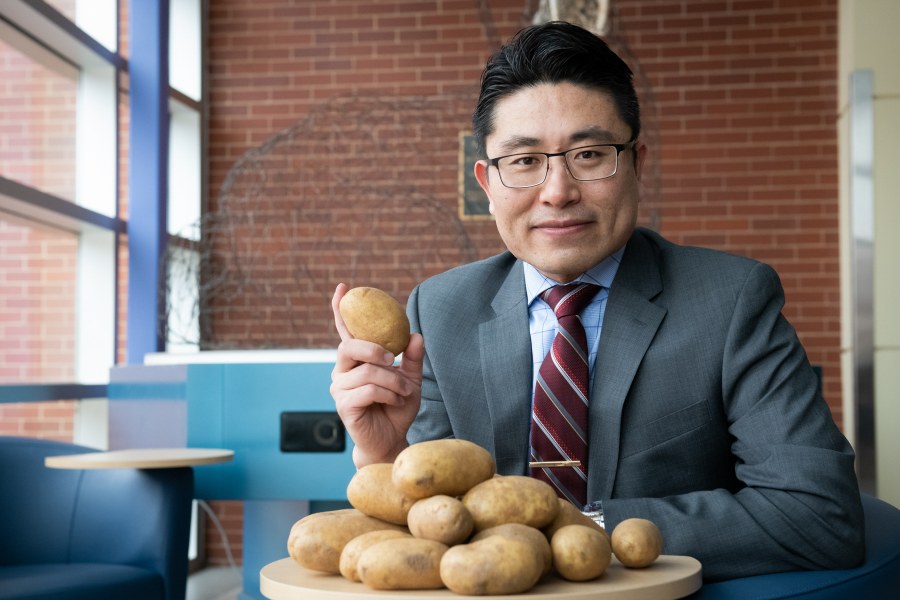 Dr. Xander Wang displays some healthy PEI potatoes. Dr. Xander Wang