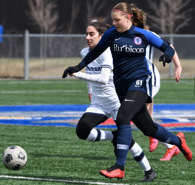 Patrycia Kozak will join the UPEI Women's Soccer Panthers this season photo of female student athlete dribbling soccer ball