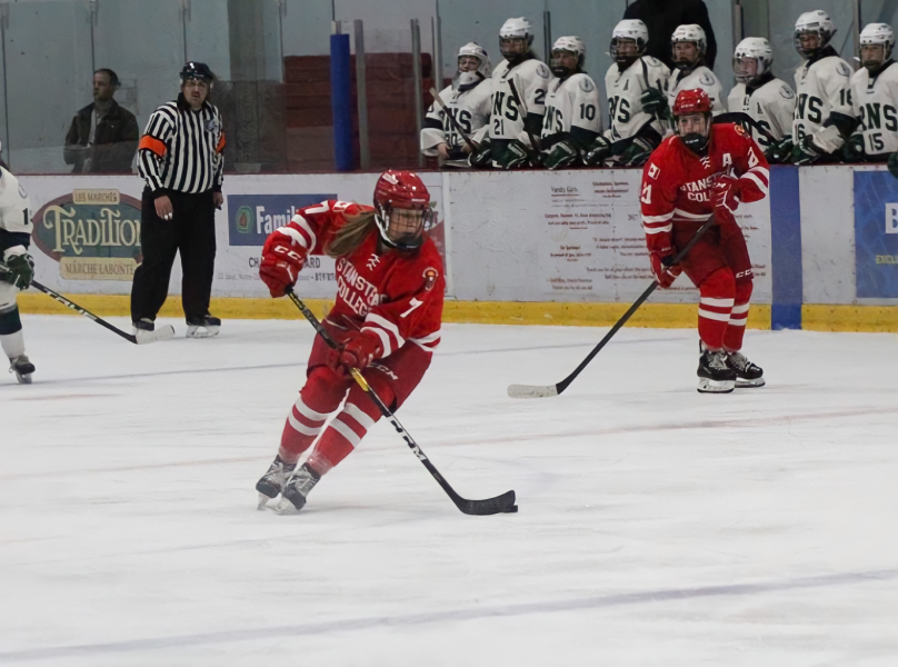 Emily Holmes will join the UPEI Women's Hockey team on the blue line this season photo of female hockey player skating with puck