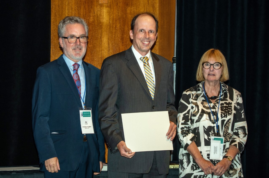 Dr. Étienne Côté (middle) during the Canadian Academy of Health Sciences induction ceremony. Dr. Étienne Côté (middle) during the Canadian Academy of Health Sciences induction ceremony.