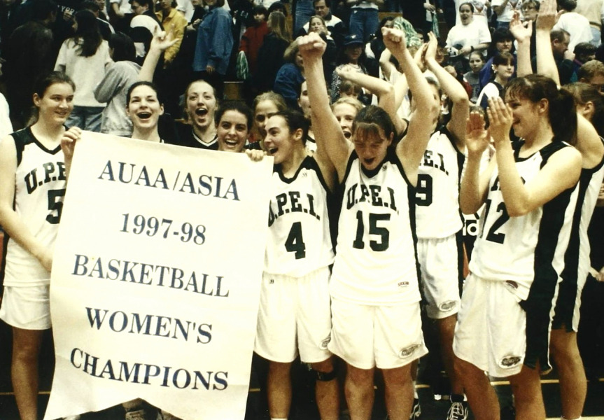 Eireann Rigby (#15) celebrates UPEI's 1997-98 AUAA championship with her teammates. Eireann Rigby (#15) celebrates UPEI's 1997-98 AUAA championship with her teammates.