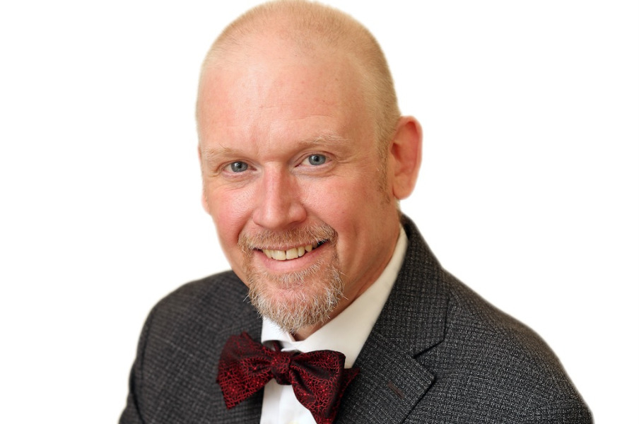 Tim Walker will begin as UPEI's new Vice-President, Administration and Finance on April 14. photo of man wearing a bow tie